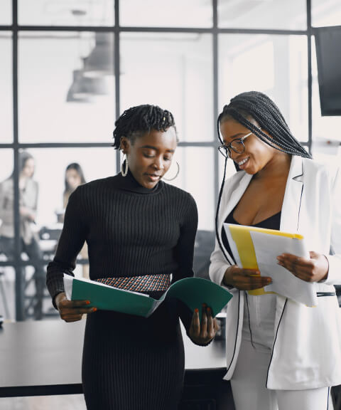 2-women-discussing-Advantages-of-opening-your-DMCC-free-zone-company